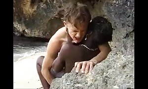African teen acquires anal fucked on an obstacle seaside